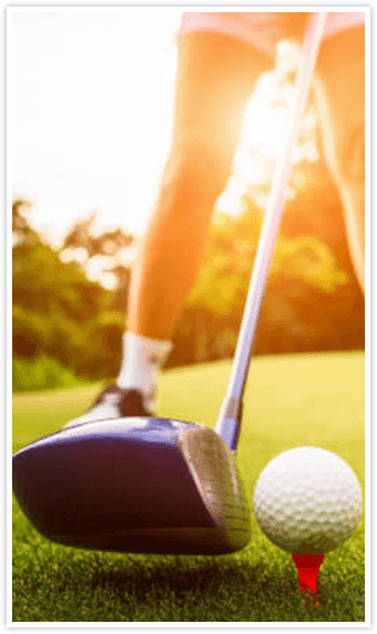 golf club and ball on tee